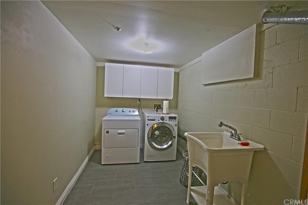 105 East Beacon Street, Unit A Alhambra, CA 91801 - Photo 15 of 15 a utility room with dryer and washer
