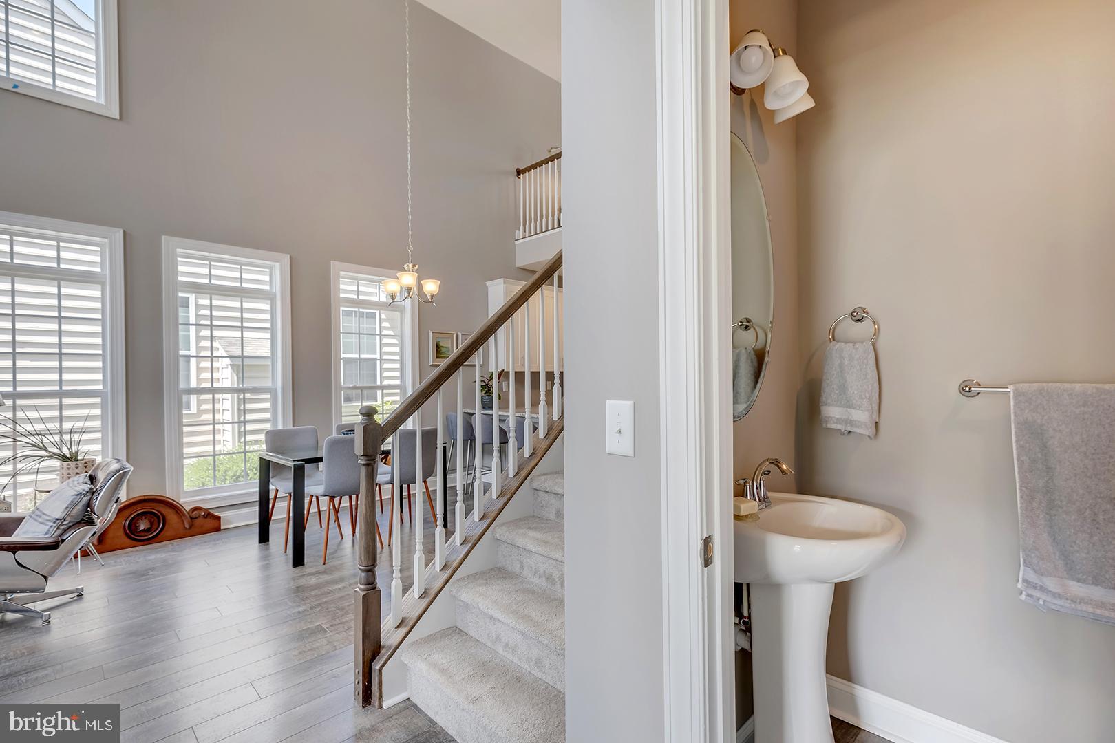 303 Brick Lane Milton, DE 19968 - Photo 11 of 71 a view of a room with lots of furniture and windows