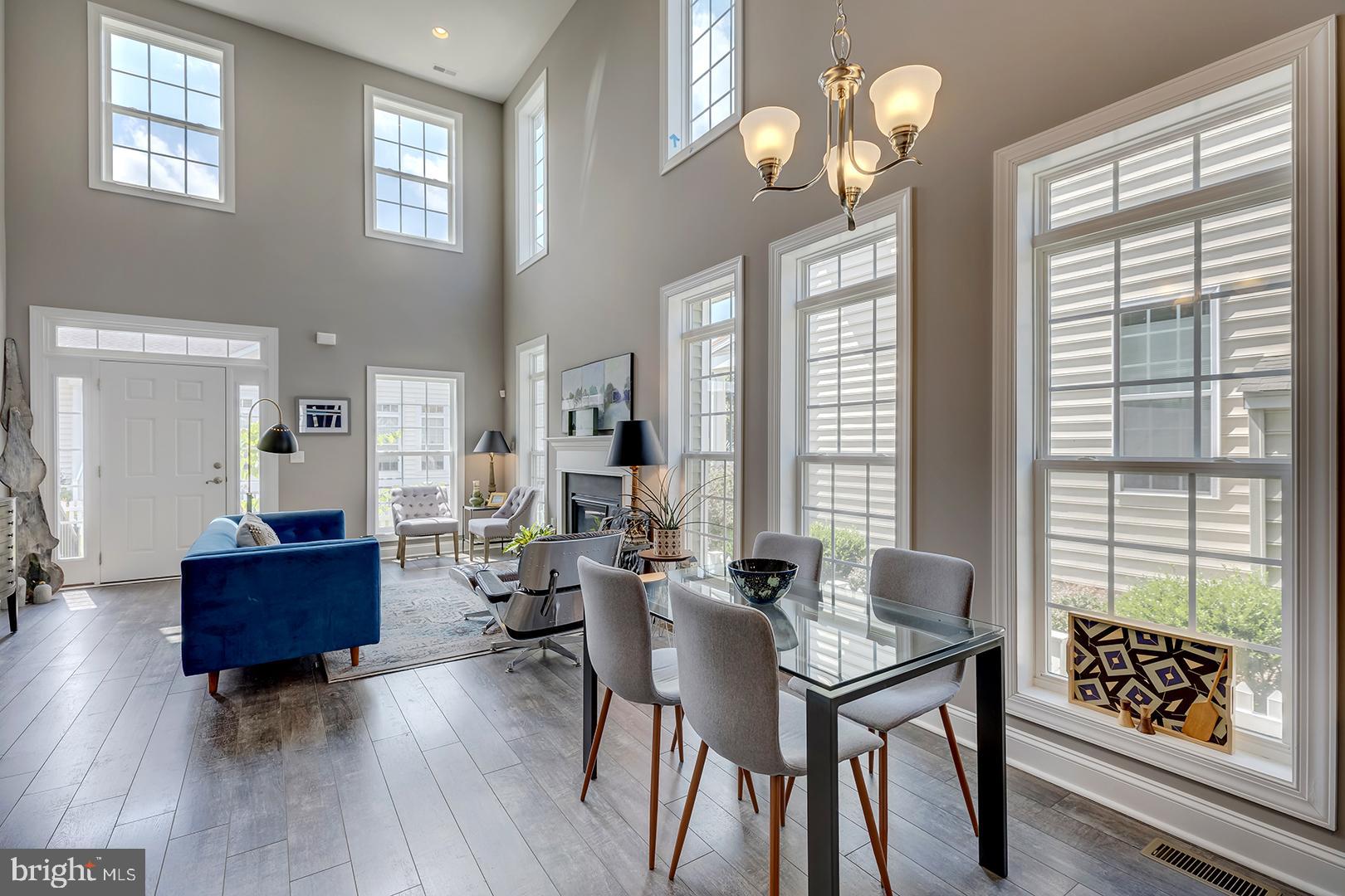 303 Brick Lane Milton, DE 19968 - Photo 14 of 71 a living room with furniture and a large window