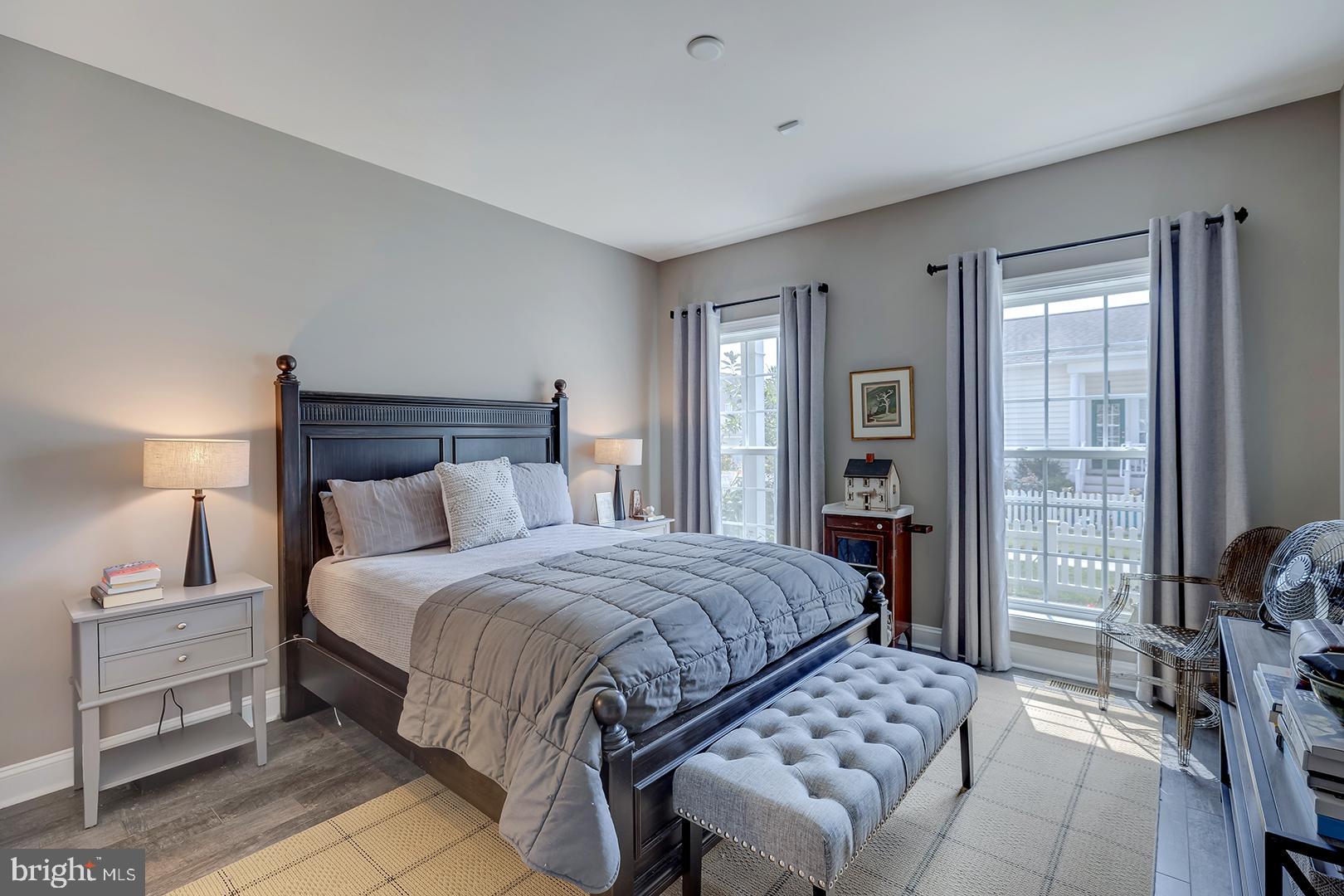 303 Brick Lane Milton, DE 19968 - Photo 27 of 71 a bedroom with a bed and a couch