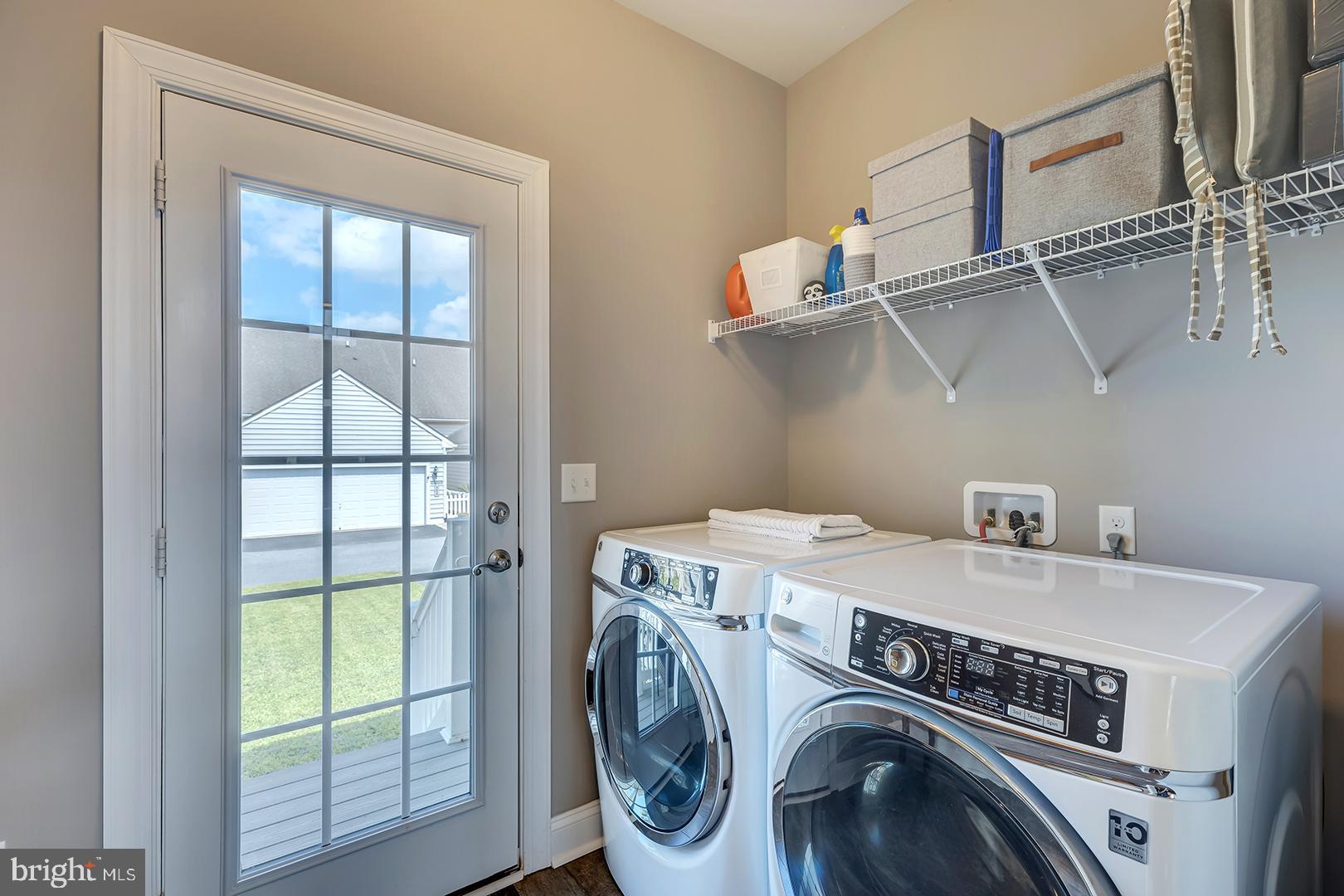 303 Brick Lane Milton, DE 19968 - Photo 43 of 71 a utility room with dryer and washer