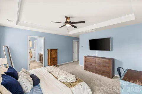 a bathroom with a bathtub and window