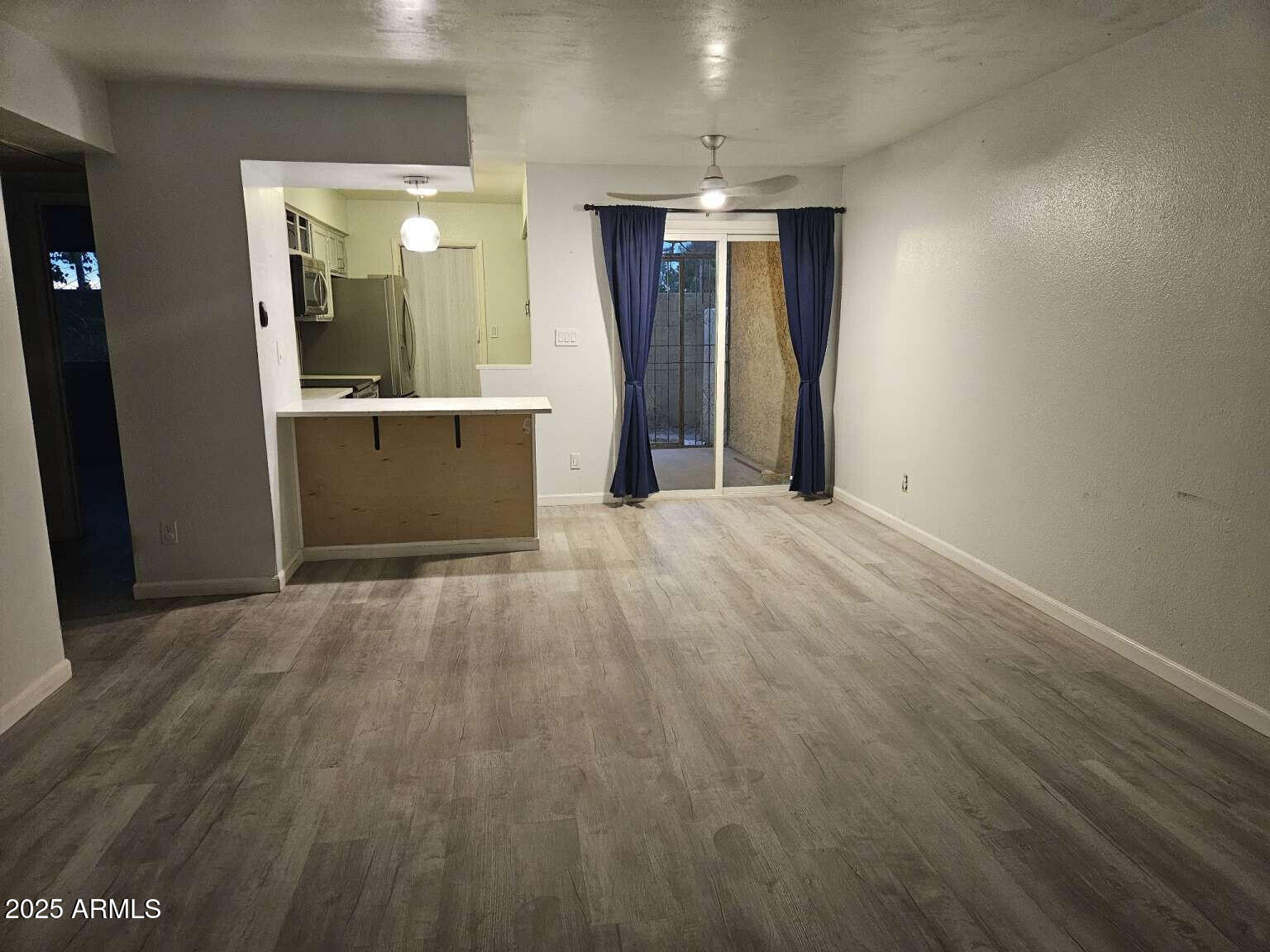 2220 West Dora Street, Unit 114 Mesa, AZ 85201 - Photo 4 of 17 wooden floor in a room