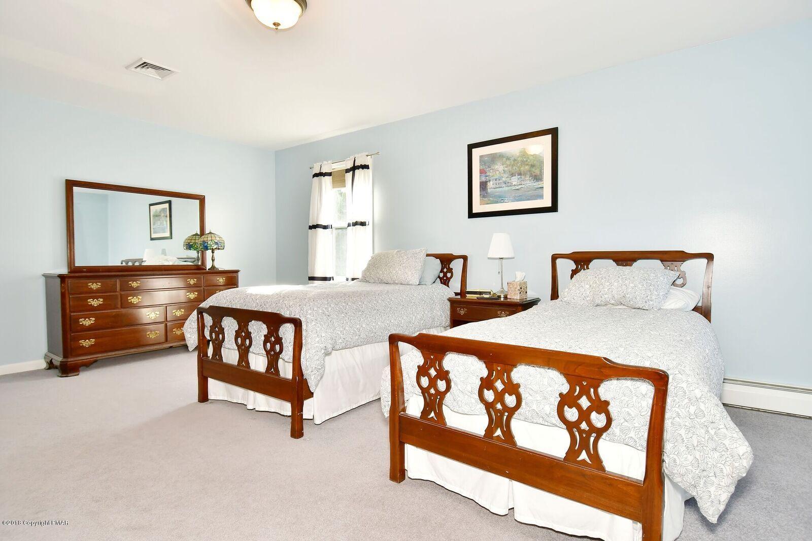 1185 Bangor Road Pen Argyl, PA 18072 - Photo 24 of 34 a bedroom with furniture and a window