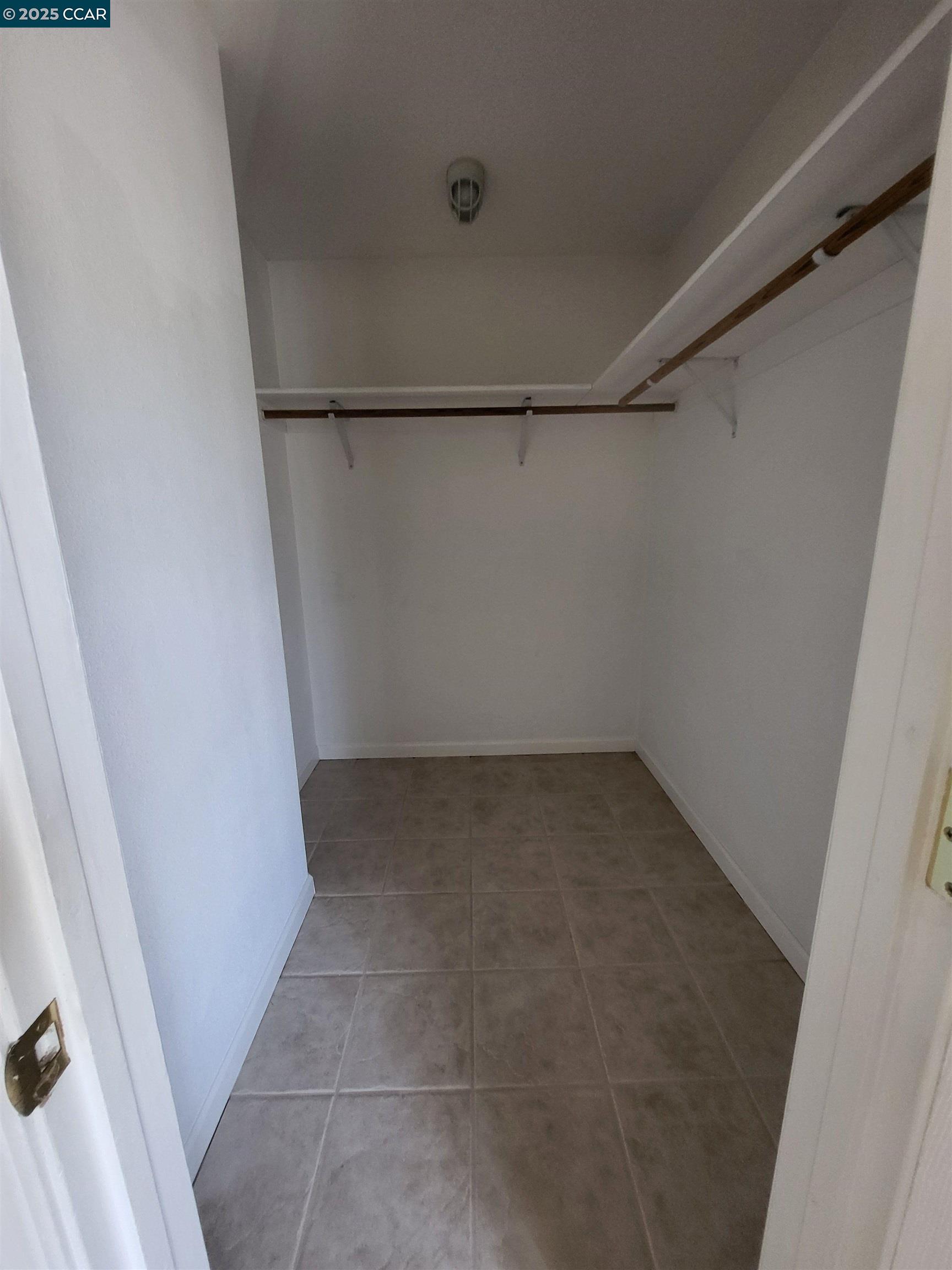 526 Harbour Way Richmond, CA 94801 - Photo 9 of 15 a view of a room with racks on the wall