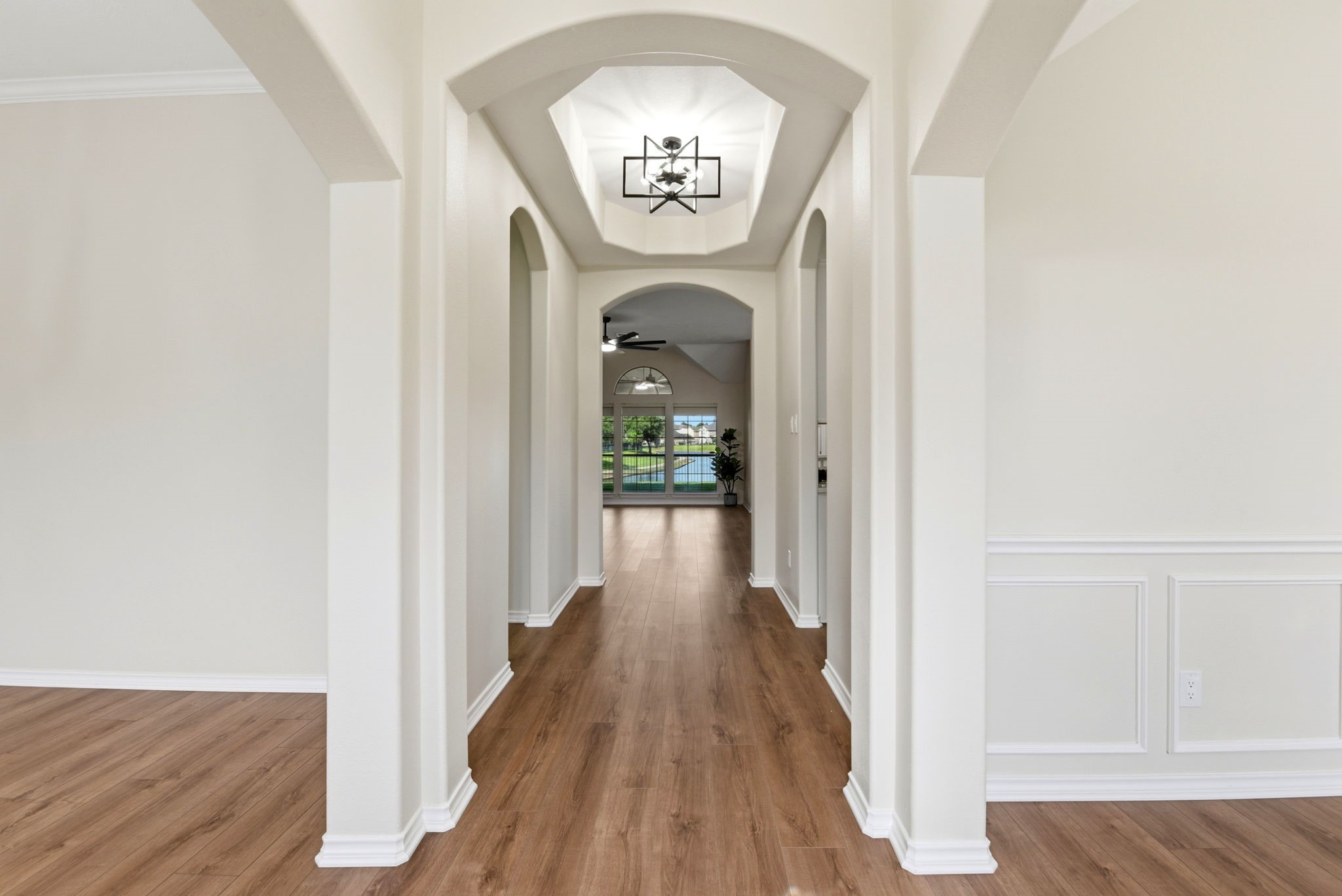 29819 South Legends Village Circle Spring, TX 77386 - Photo 9 of 48 a view of a hallway with wooden floor