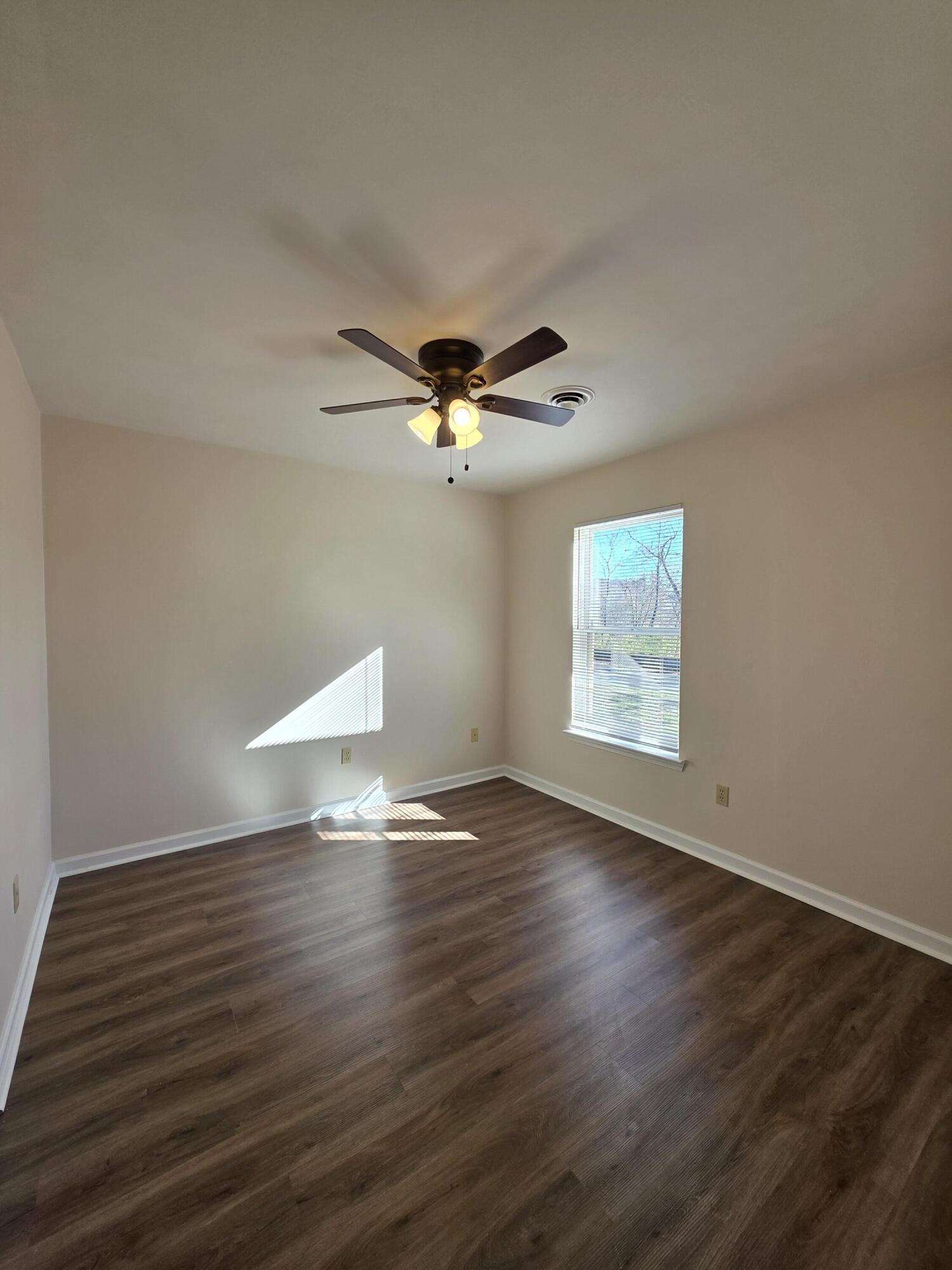 1105 Riverside Boulevard Southwest Roanoke, VA 24016 - Photo 10 of 11 a view of wooden floor and cabinet in a room
