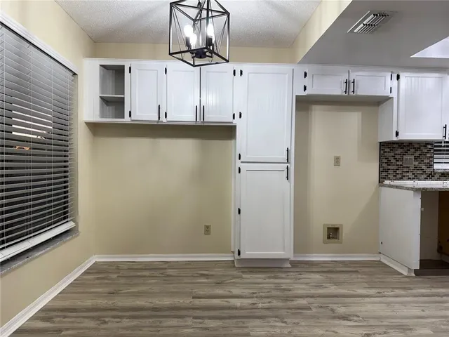a view of a kitchen with electric equipment