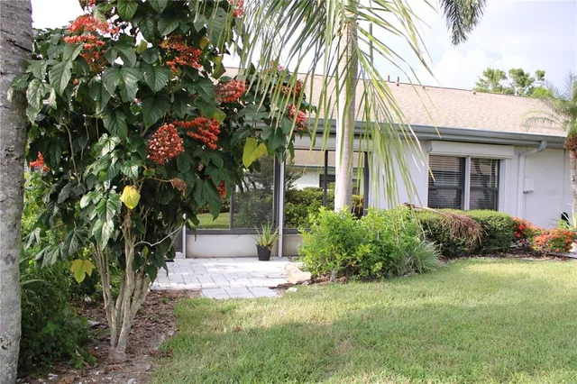 a view of outdoor space with sign board and lake view