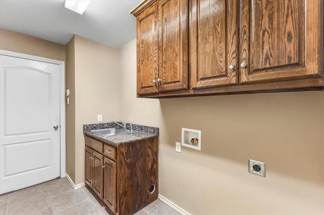 a utility room with washer and dryer