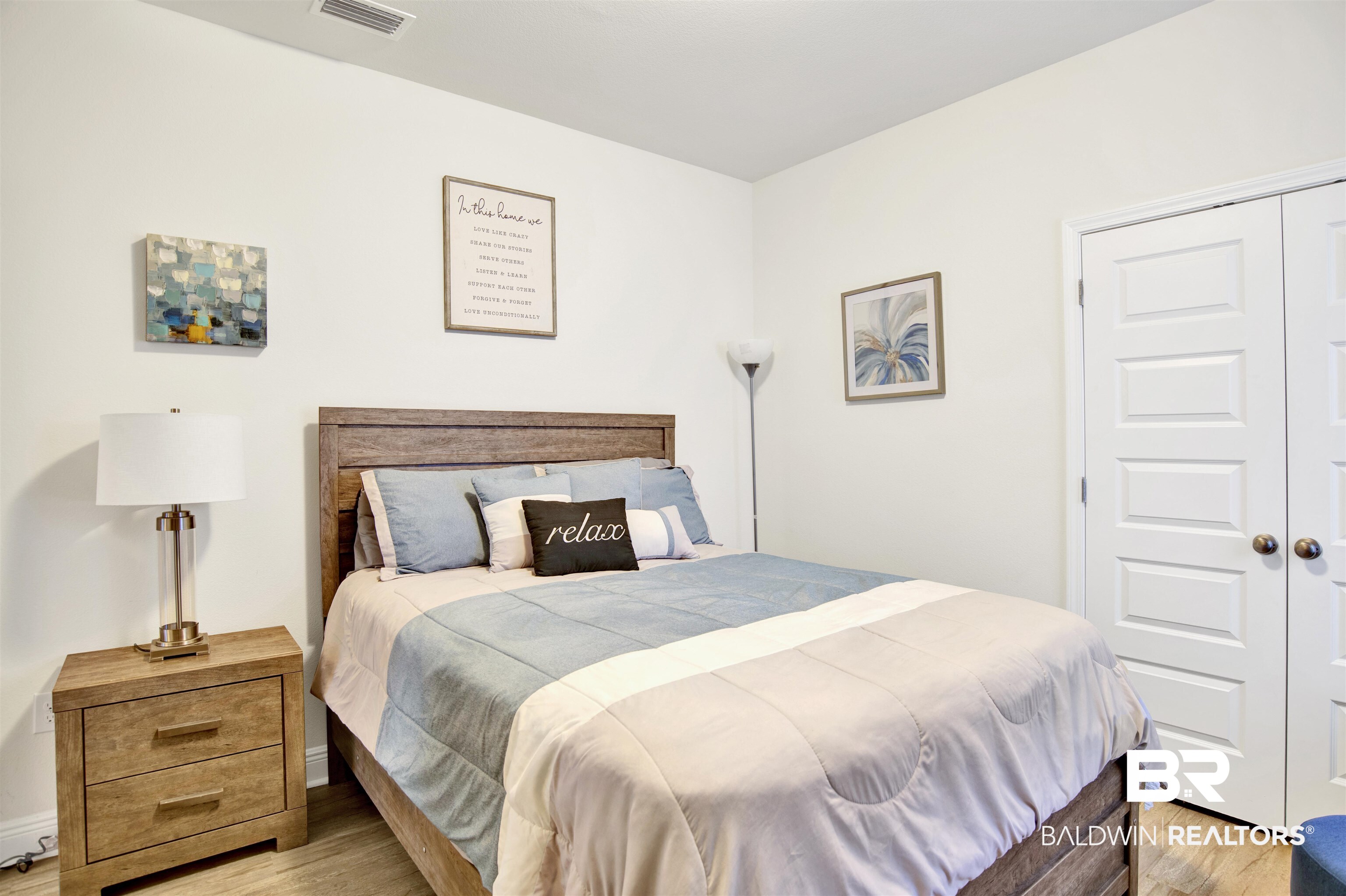 1468 Surrey Loop Foley, AL 36535 - Photo 16 of 28 Bedroom with light wood-style flooring and a closet