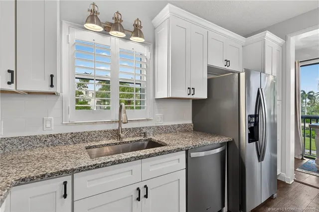 $199,900 | 13232 Northwest Harbour Ridge Boulevard, Unit 8B, Palm City, FL 34990