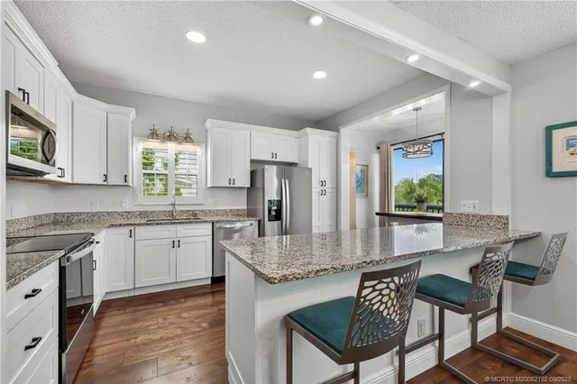 $199,900 | 13232 Northwest Harbour Ridge Boulevard, Unit 8B, Palm City, FL 34990