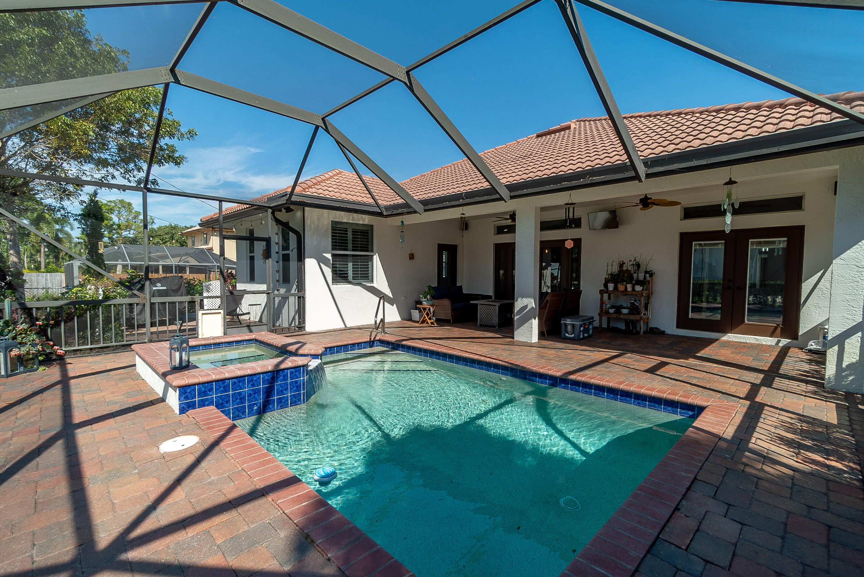 5587 1st Road Lake Worth, FL 33467 - Photo 35 of 50 038_Pool with Screen Enclosure