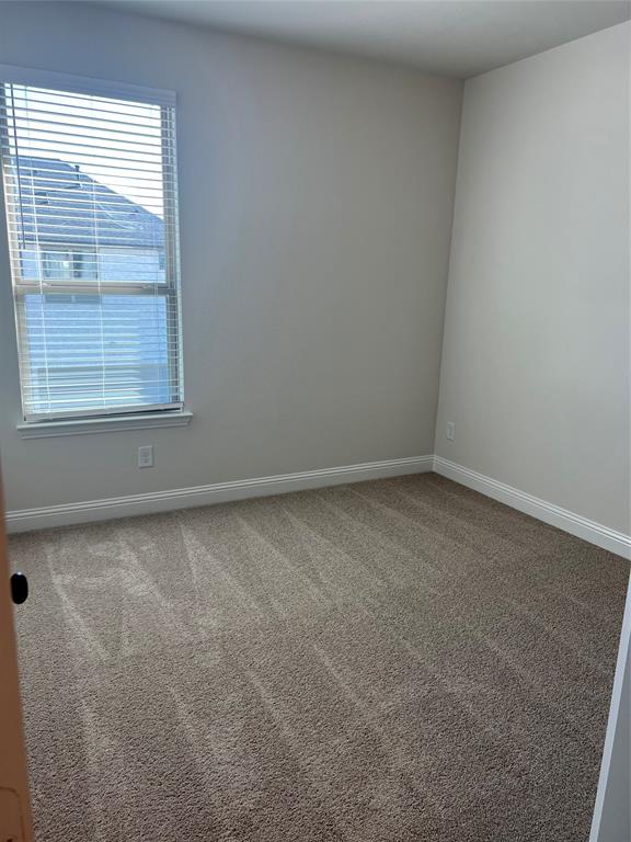 2522 Brunswick Way Allen, TX 75013 - Photo 16 of 19 an empty room with a window