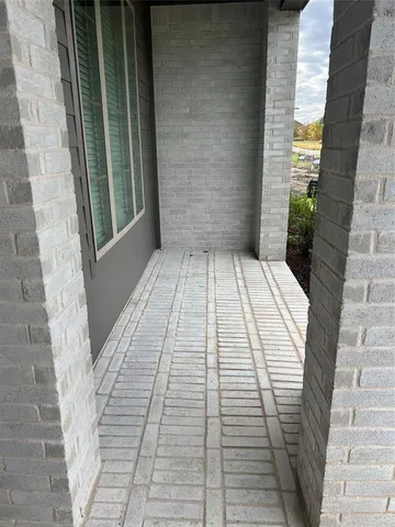 a view of a balcony with a bathroom