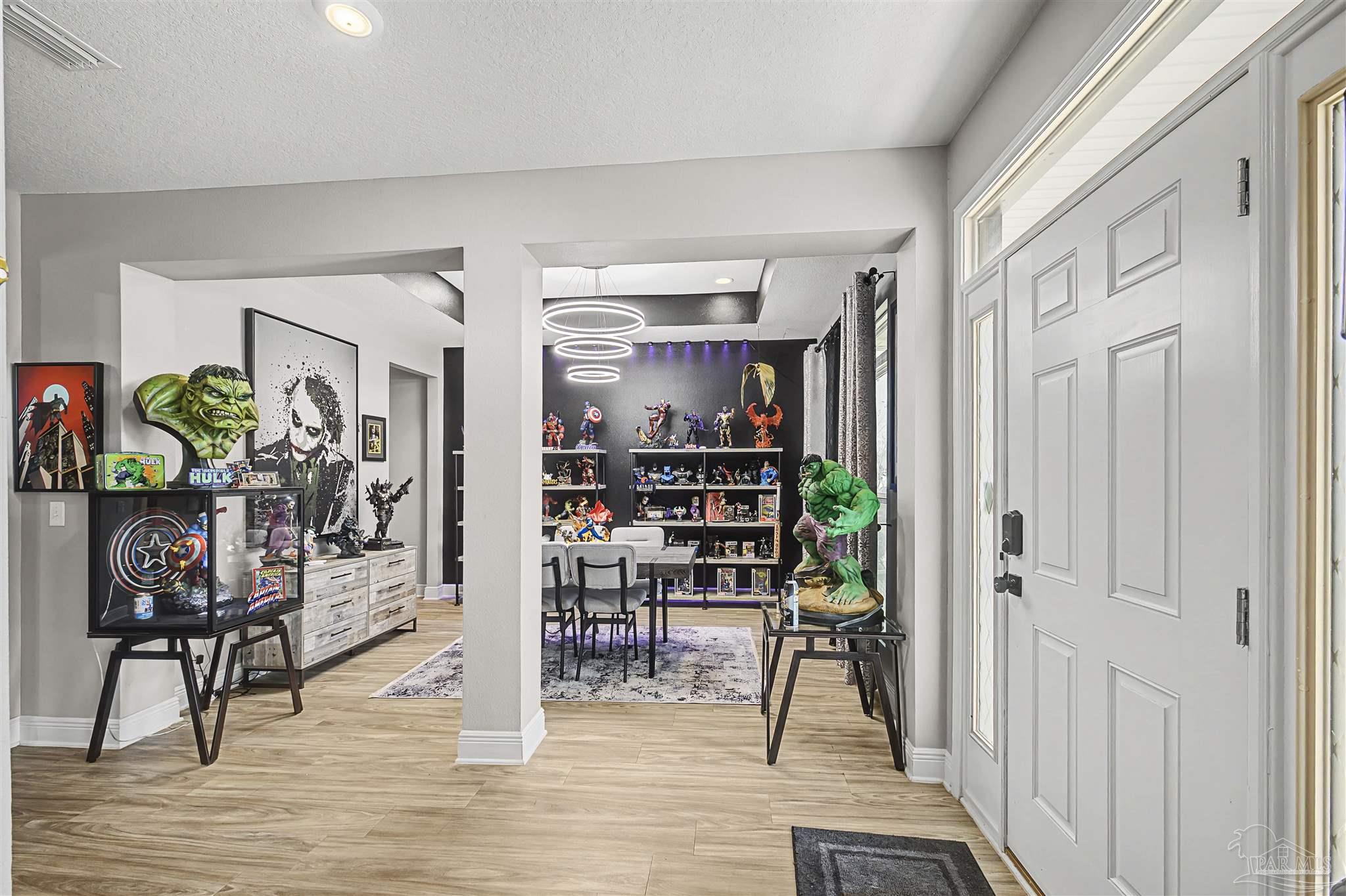 327 Cayden Way Cantonment, FL 32533 - Photo 38 of 64 a view of a entryway with furniture and floor to ceiling window