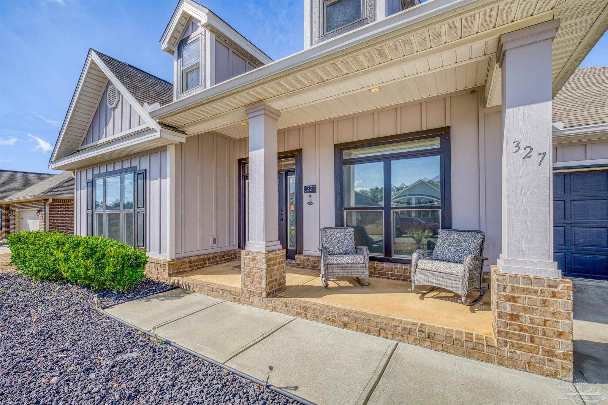 327 Cayden Way Cantonment, FL 32533 - Photo 45 of 64 a view of house with outdoor seating space