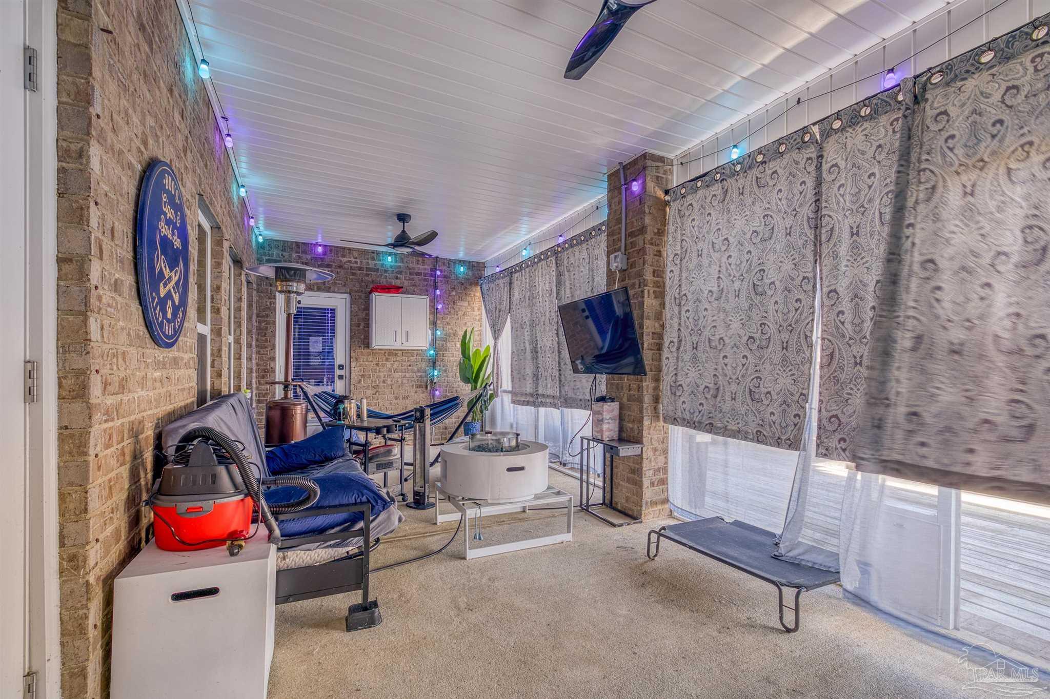 327 Cayden Way Cantonment, FL 32533 - Photo 49 of 64 a view of a room with gym equipment
