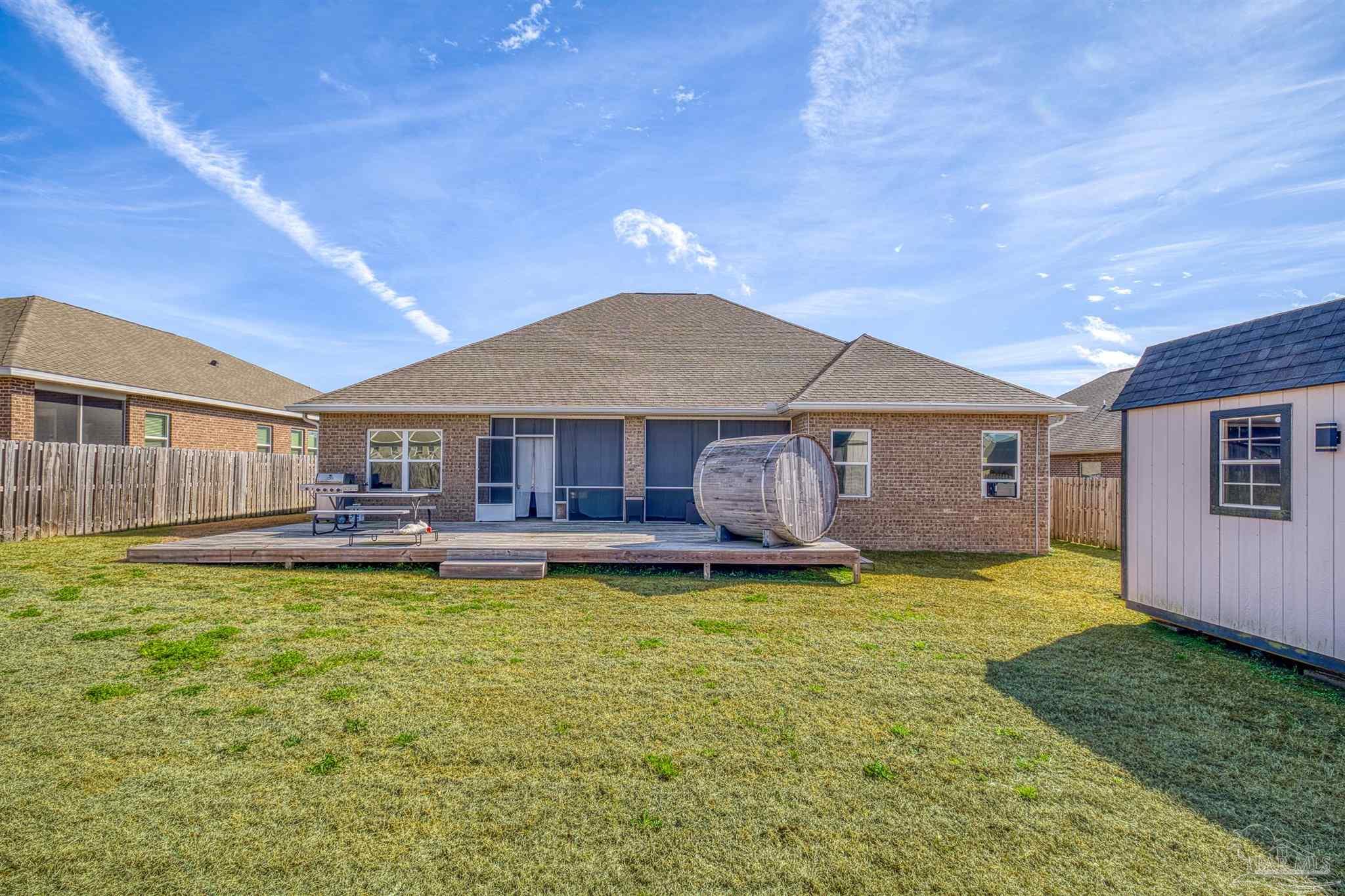 327 Cayden Way Cantonment, FL 32533 - Photo 59 of 64 a house with swimming pool in front of it