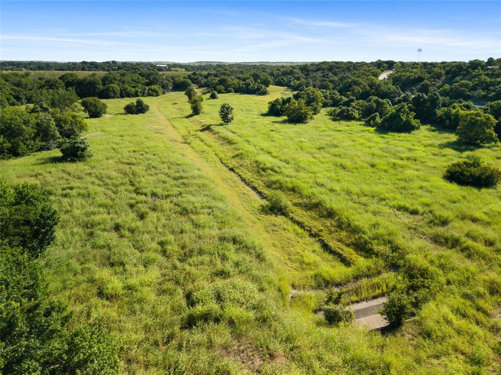 Tbd Sam Bass Road Willow Park, TX 76087 - Photo 1 of 12 a view of a lake with houses