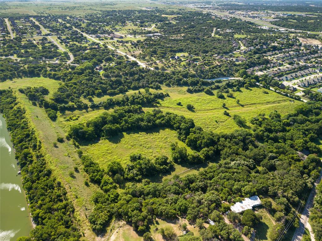Tbd Sam Bass Road Willow Park, TX 76087 - Photo 7 of 12 an aerial view of residential houses with outdoor space and trees