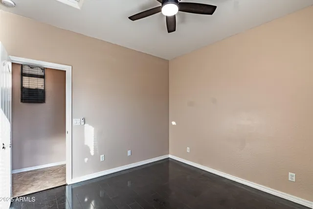 a bathroom with a double vanity sink toilet mirror and bathtub