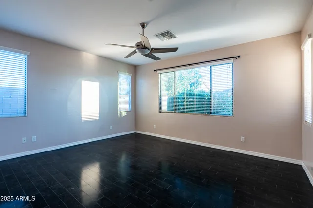 a bathroom view of a toilet and a sink