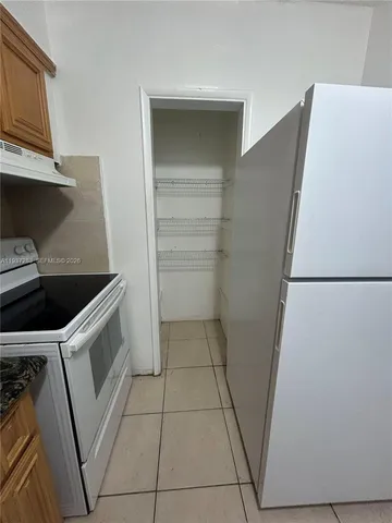 a utility room with washer and dryer