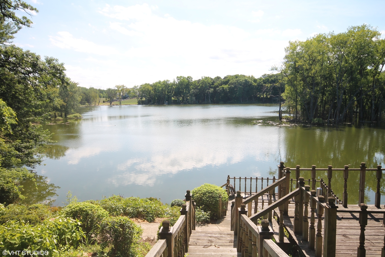 231 West County Line Road Barrington Hills, IL 60010 - Photo 28 of 35 a view of a lake with a mountain view