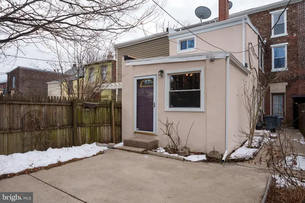 a front view of a house with a garage