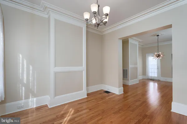 a view of a chandelier in a room