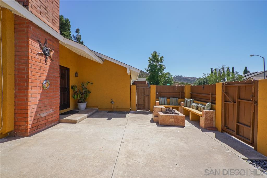 2305 Doubletree Road Spring Valley, CA 91978 - Photo 14 of 22 Spacious gated front patio complete with built-in bar, fire pit and seating, perfect for entertaining!