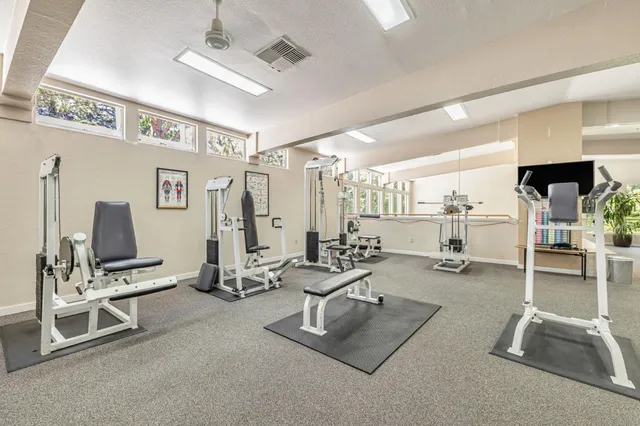 a view of a room with window and stairs