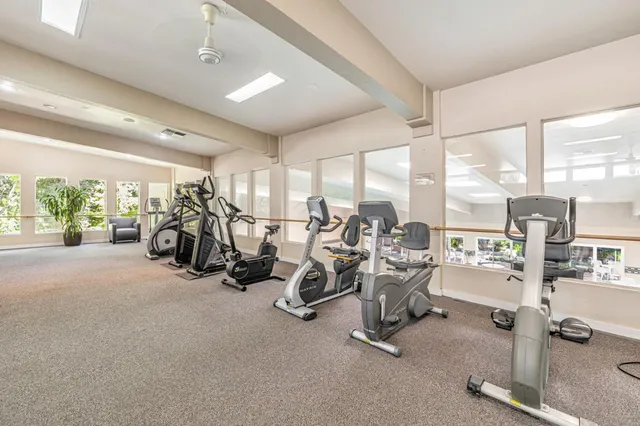 a very nice looking dining room with a table and chairs