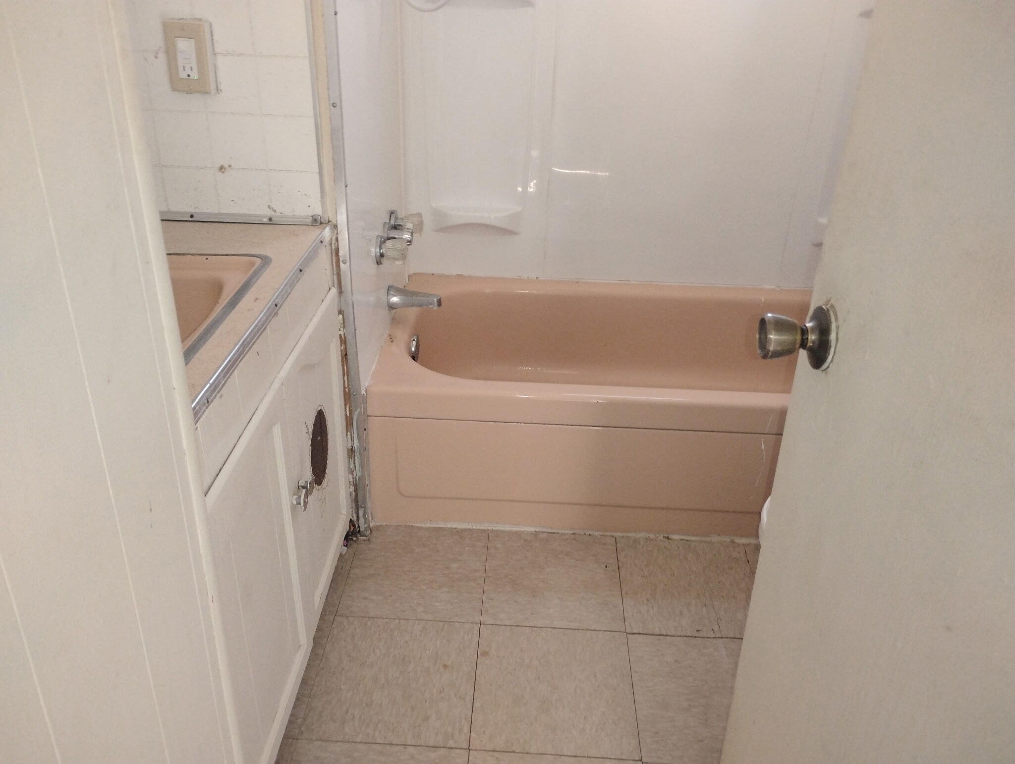 6746 Adobe Road, Unit 41 Twentynine Palms, CA 92277 - Photo 6 of 7 a bathroom with a bathtub and a shower