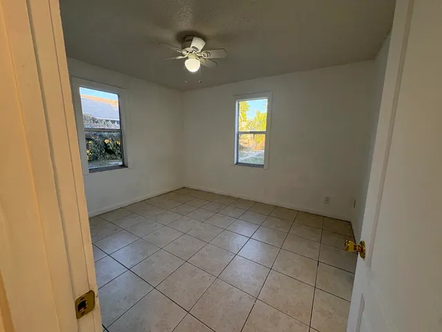 an empty room with windows