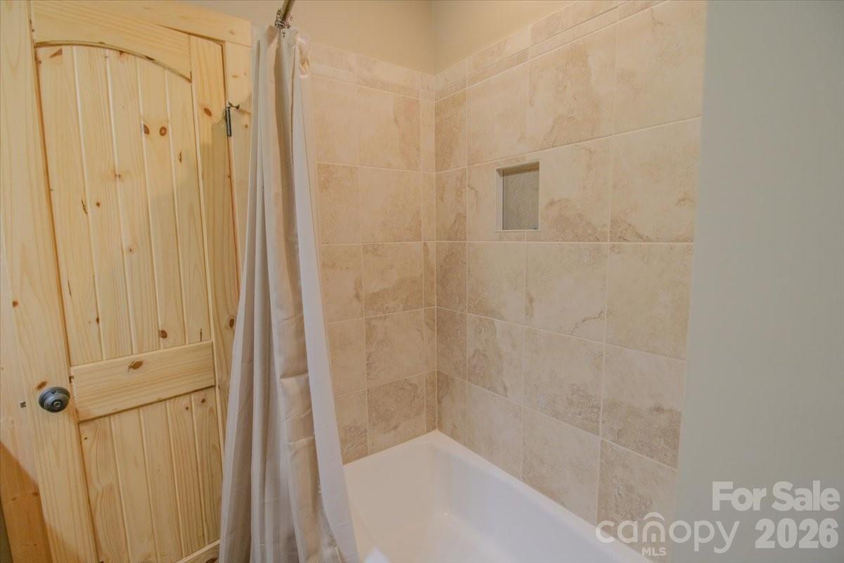 1083 Union Community Road Thurmond, NC 28683 - Photo 21 of 47 a bathroom with a shower