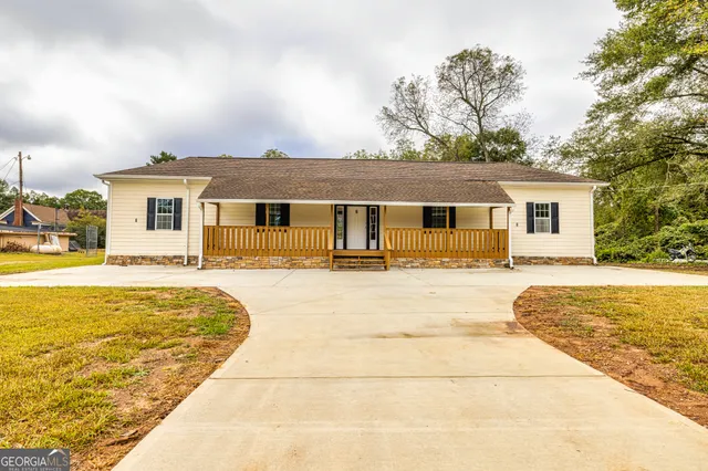 a view of a house with a swimming pool
