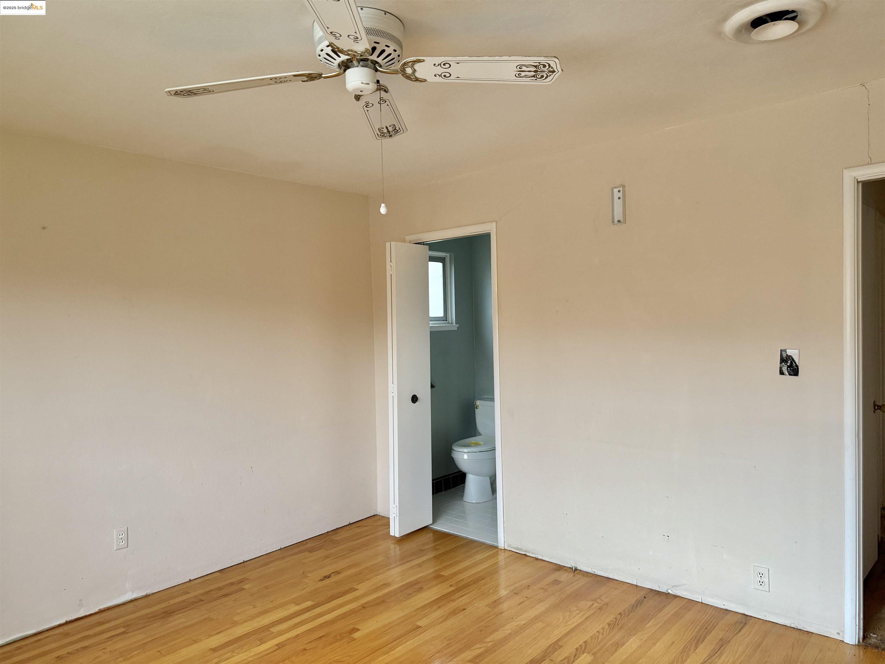 949 Flores Way Rio Vista, CA 94571 - Photo 13 of 19 a view of a big room with wooden floor