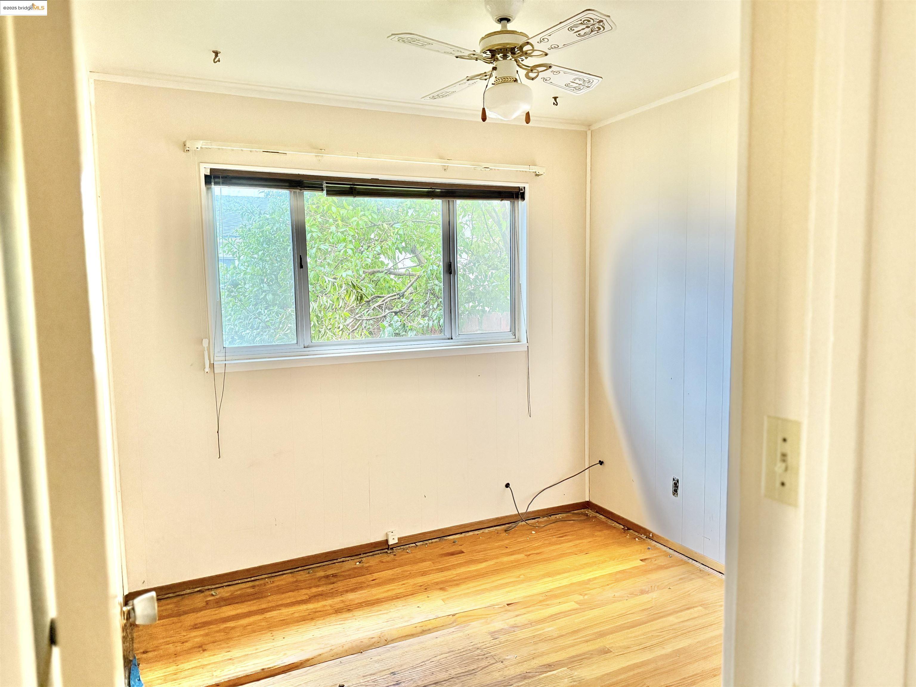 949 Flores Way Rio Vista, CA 94571 - Photo 15 of 19 a view of a room that has a window and a ceiling fan
