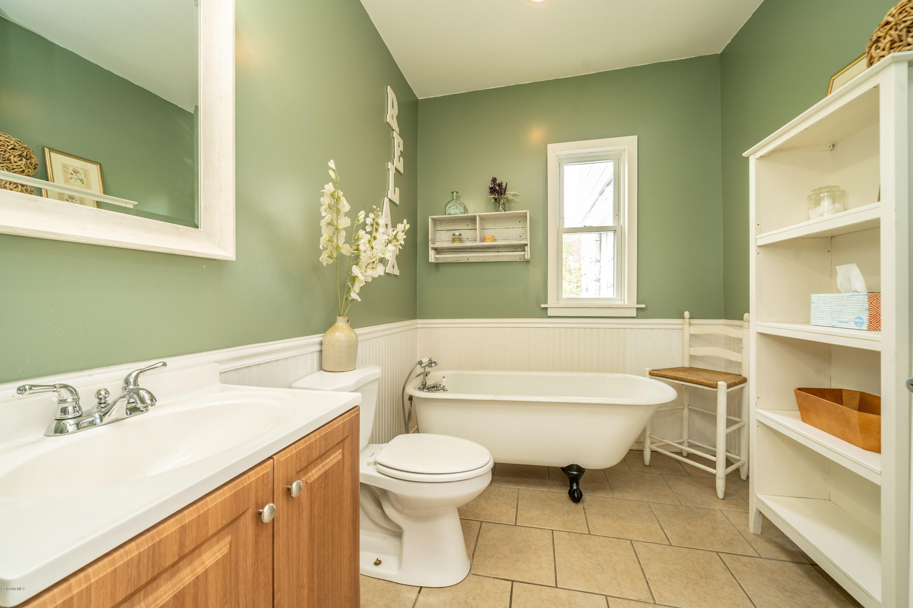 22 Wade Inn Road Becket, MA 01223 - Photo 11 of 32 a bathroom with a sink a toilet and mirror