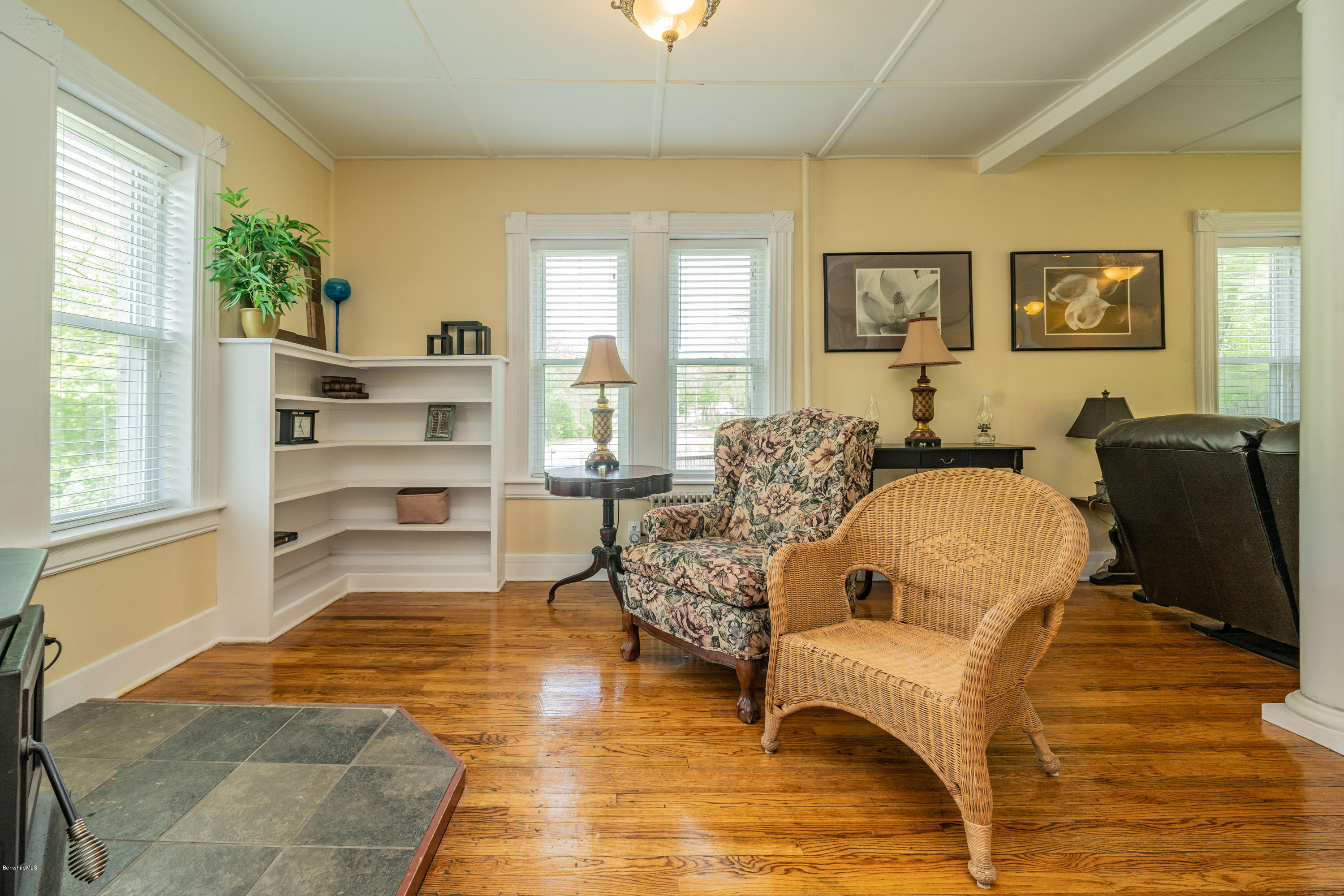 22 Wade Inn Road Becket, MA 01223 - Photo 17 of 32 a living room with furniture and a fireplace