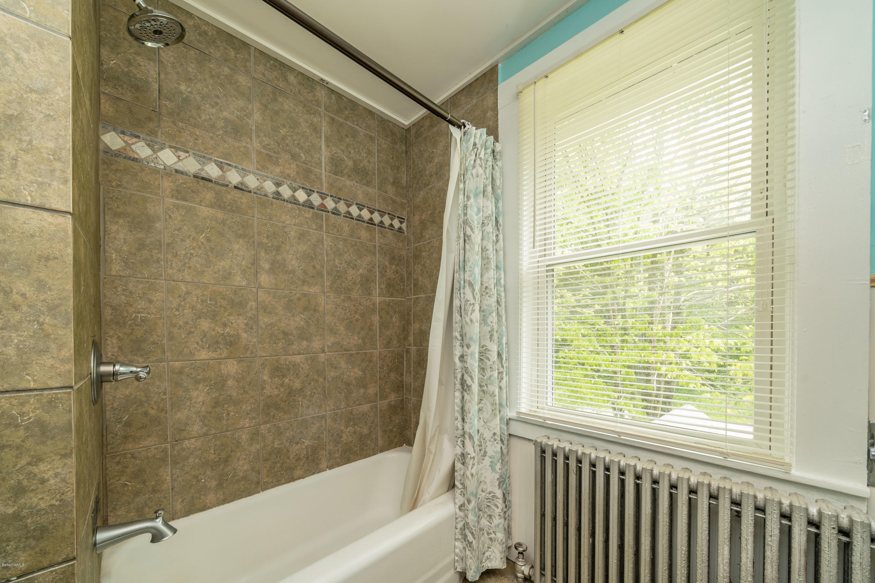 22 Wade Inn Road Becket, MA 01223 - Photo 28 of 32 a bathroom with a bathtub and a shower