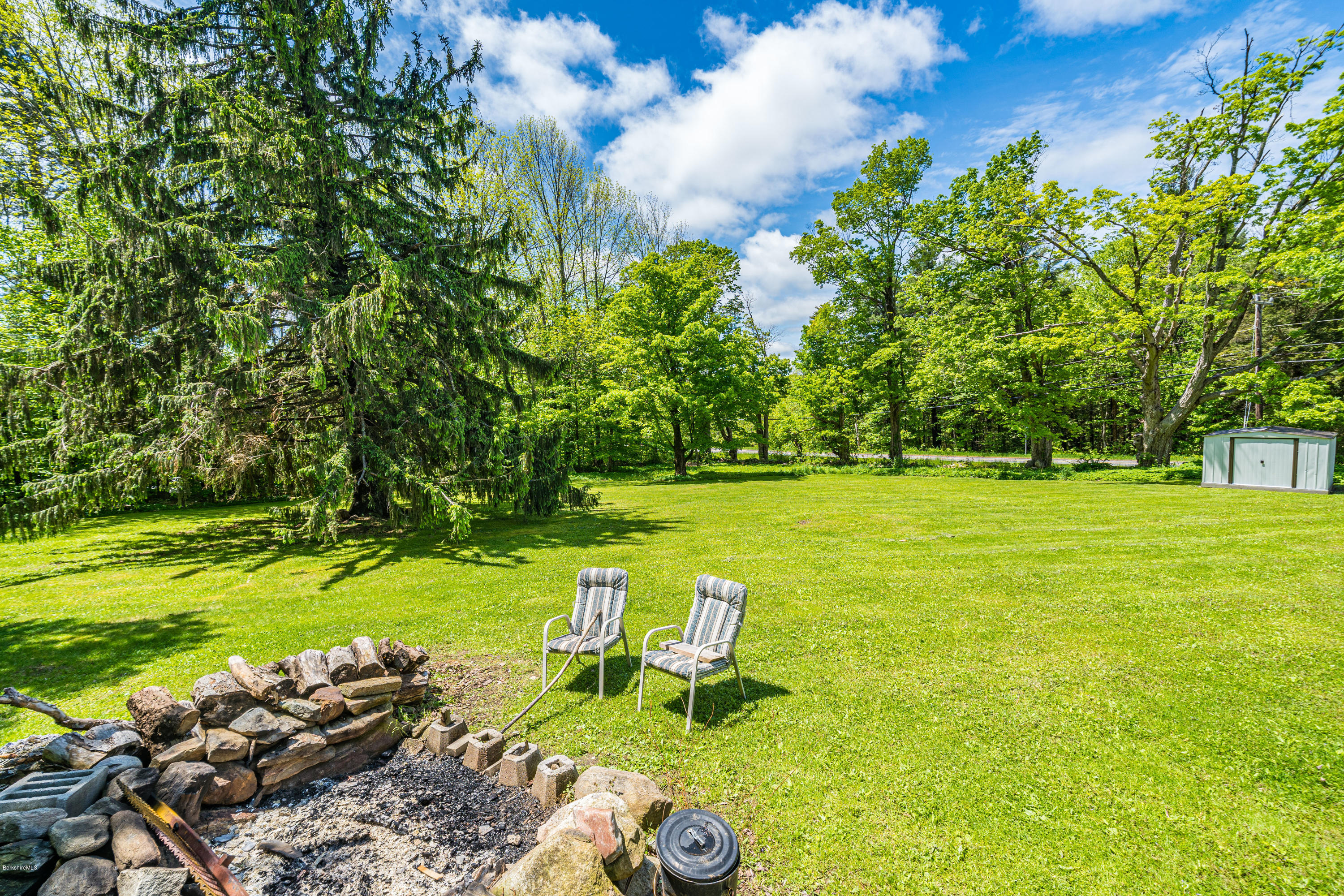 22 Wade Inn Road Becket, MA 01223 - Photo 32 of 32 a view of a lake with a yard