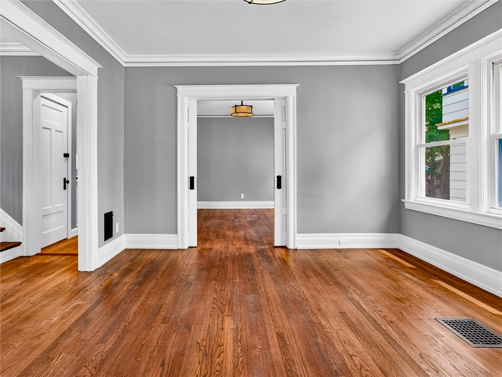 132 Mulberry Street Rochester, NY 14620 - Photo 7 of 50 Great room with refinished hardwood floors