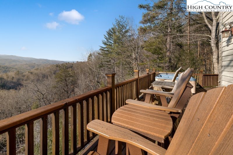 1155 Elk Ridge Road Ferguson, NC 28624 - Photo 7 of 46 a view of a balcony with chairs
