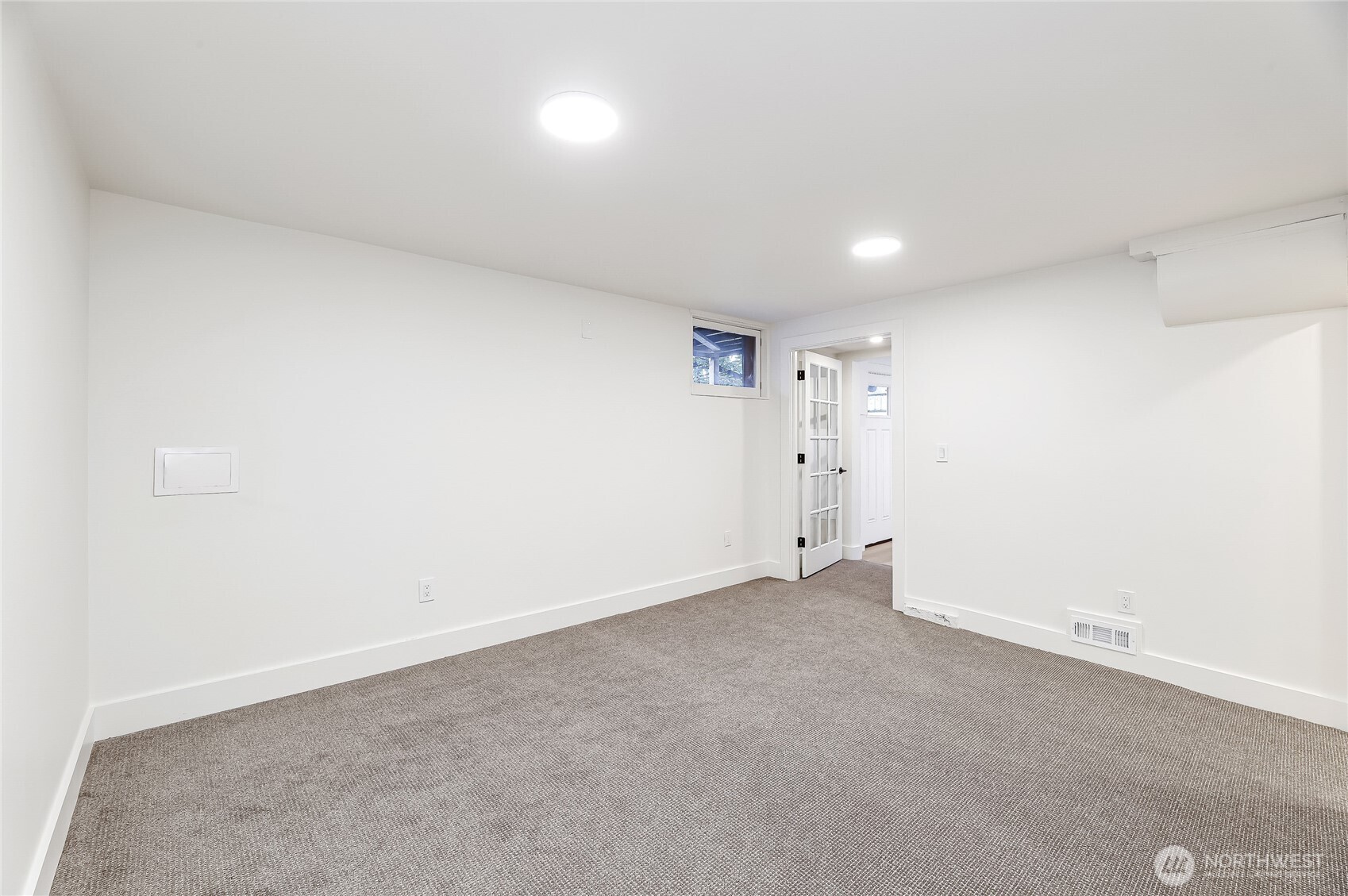 2207 East Republican Street Seattle, WA 98112 - Photo 17 of 24 an empty room with an entryway
