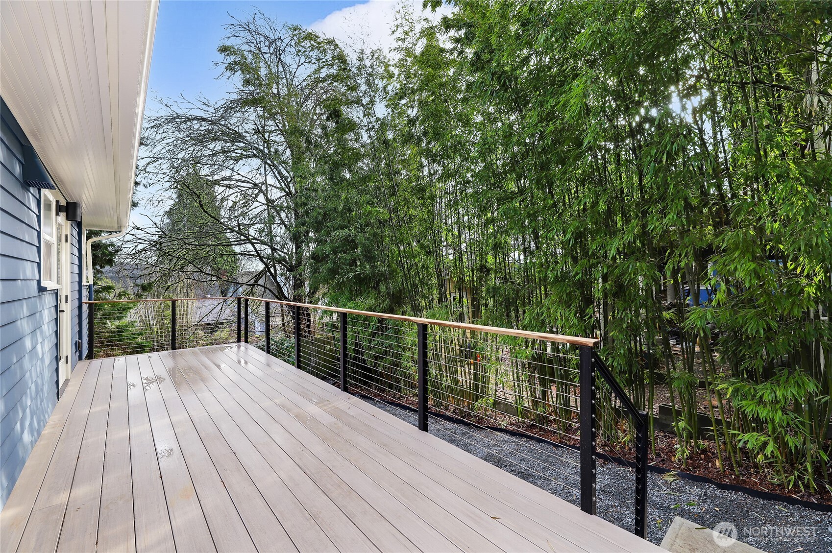 2207 East Republican Street Seattle, WA 98112 - Photo 21 of 24 a view of balcony with wooden floor and fence