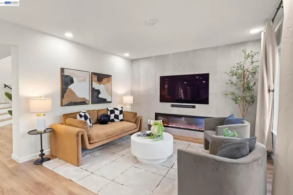 a living room with furniture and a couch